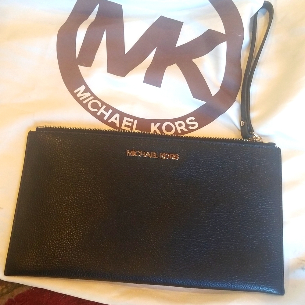 Michael Kors black leather with gold hardware wrislet. 10Lx5.5H